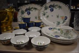 A mixture of modern ceramics including Barratts plates and Portmeirion bowls and a mug.