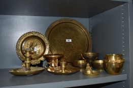 A selection of brass wares including Arabic or Islamic style chase work bowls