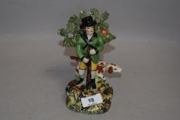 A Staffordshire flat back style figure titled Sportsman with a hunting theme