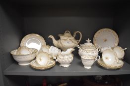 A Victorian tea service in a Rococo or Rockingham style design