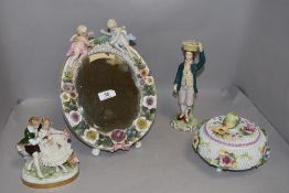 A selection of German style porcelain including cherub and foliate mirror AF, figure group marked