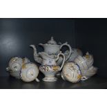 A Victorian part tea service possibly by Rockingham having gilt and cobalt decoration