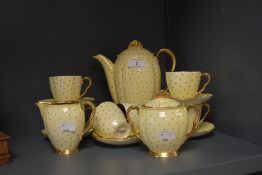 An art deco design part tea service by Carlton ware with green and cream polka dot pattern