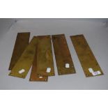 A set of six door furniture finger plates in brass