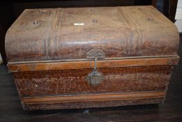 A vintage metal tin trunk