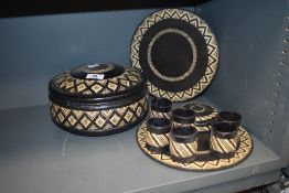 A selection of Moroccan style woven baskets and cup set