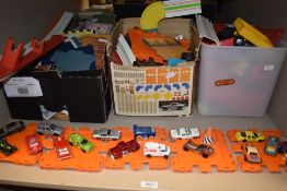 A selection of Matchbox diecast cars tracks and raceway