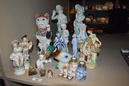 A mixed lot of Vintage and antique ceramics to include to novelty figure bud vases,Wade figures