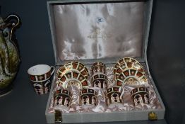 A fine case coffee service by Royal Crown Derby along with similar Imari mug