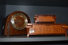 Two matching early 20th century casket style cases with oak and mahogany frames with an Art Deco