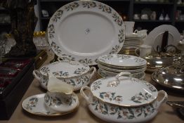 Two Crown Staffordshire tureens, a platter, bowls, plates and a gravy boat and sauce.