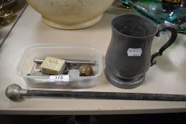 A mixed lot of items including a small oil can, coins,thermometer, Baton withvembosssed handle for