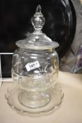 A Victorian cut glass lidded sweetmeat jar having foot to base.