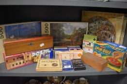 A selection of childrens puzzles and games including Jenga, Spin quiz etc