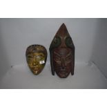 Two 20th century hand carved wooden ethnic tribal or ritual masks