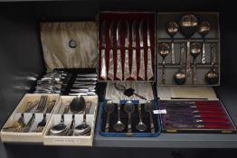 A selection of cased cutlery and flatwares including spoons fruit knives and forks