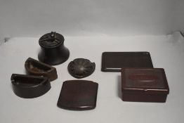 A selection of art deco bakelite cigarette smokers accessories including cases, ashtrays and