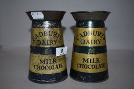 A pair of early 20th century advertising tins for Cadburys in the form of dairy cans