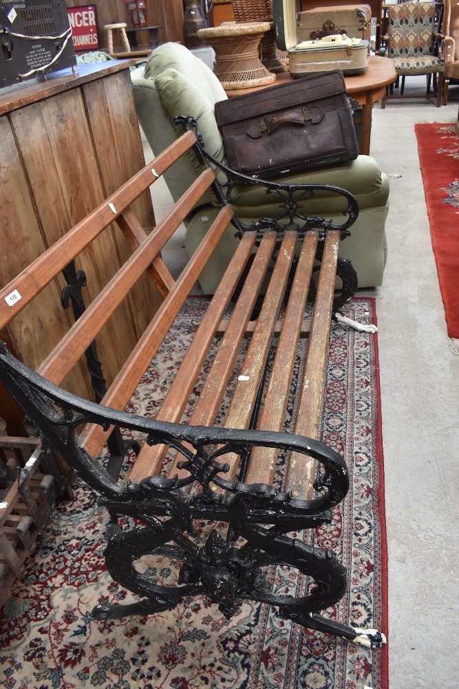 A Victorian cast iron Coalbrookdale style bench, later painted and slatted