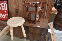 An antique foot or prayer stool, an oriental style light fitting and a three legged stool,