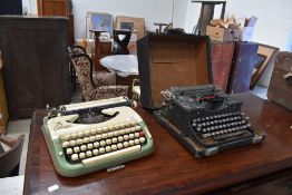 Two vintage typewriters, Princess 300 & Royal