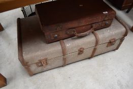 A vintage leather effect suitcase together with a ribbed travel trunk