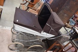 A vintage pram by Silver Cross