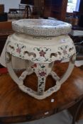 An Oriental painted stool or occasional table