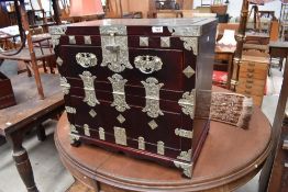 A reproduction Oriental style cabinet