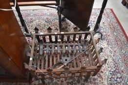 A traditional cast dog grate