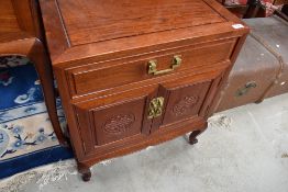 An Oriental hardwood side cabinet, width approx. 56cm