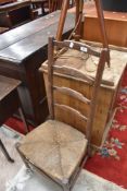 A 19th Century rush seated ladder back chair