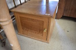 A modern golden oak cabinet