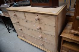 A 19th Century and later stripped pine chest of two over three drawers, width approx. 118cm