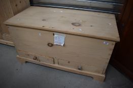 A 19th Century stripped pine bedding box having two drawers to base, dimensions approx. W100 D50