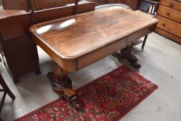 A 19th Century bleached rosewood console table in the manner of Gillows having vase column over