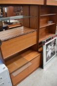 A pair of mid Century teak wall units