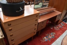 A vintage teak effect three piece bedroom suite, probably 1980s