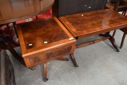 Two reproduction yew wood coffee/occasional tables both having drop flaps, Regency style frames