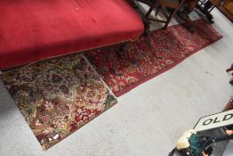 A vintage carpet runner and carpet piece