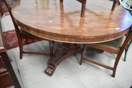 A William IV Rosewood centre table having circular top, faceted column and typical triform base,