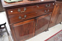 A 19th Century mahogany secretaire chest having crossbanded decoration to top, dummy double drawer