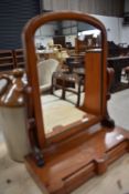 A Victorian mahogany toilet mirror having double drawer base