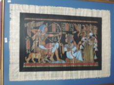 A modern framed Egyptian painting on papyrus, of traditional ancient Egyptian hieroglyph design,