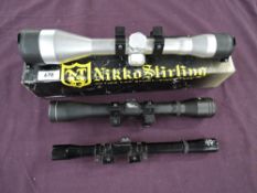 A Gold Crown Nikko Sterling Telescopic sight in box along with a Silver Antler Scope and similar