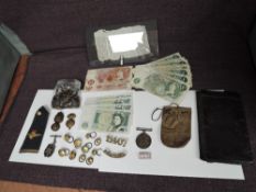 A collection of Militaria, Coins and Banknotes including military pigeon message carring capsule
