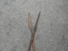 Two Tribal Spears possibly African both with metal spear heads, one for fishing, spear length 137cm,