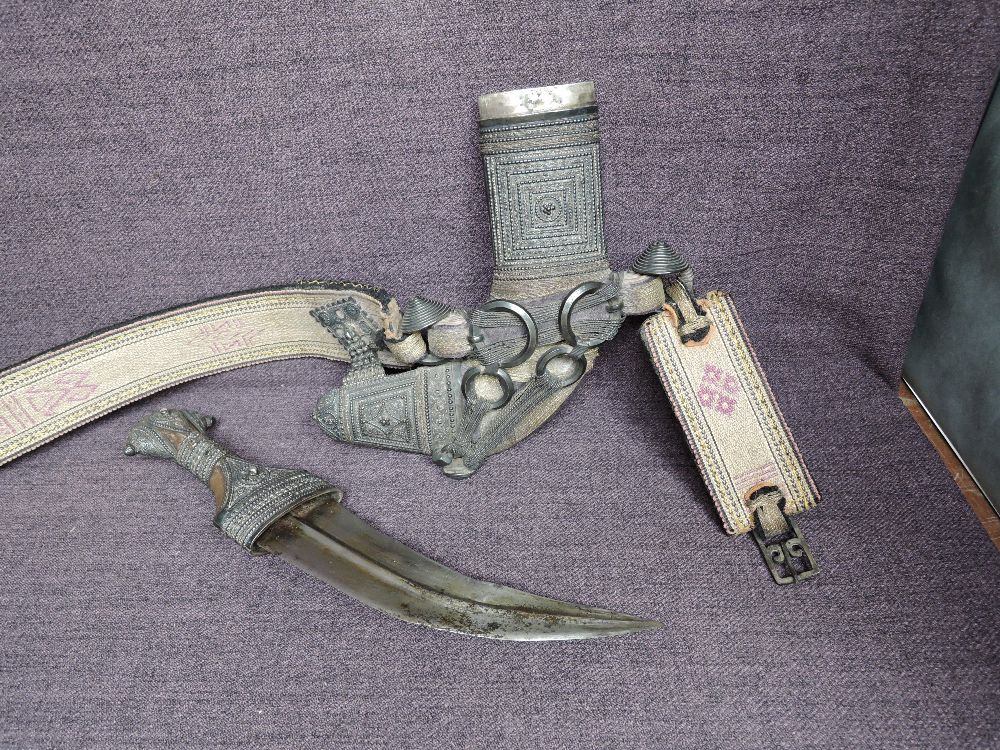 A middle eastern Khanjar/Jambiyya possibly 19th century having wood handle and being highly