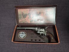 A Kolser Spain Replica Single Action Fast Draw 45 Gun with no pellets, barrel length 17cm in card