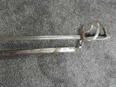 An Italian 1888 pattern Cavalry Officers Sword with scabbard, blade marked Gilardoni Milano and